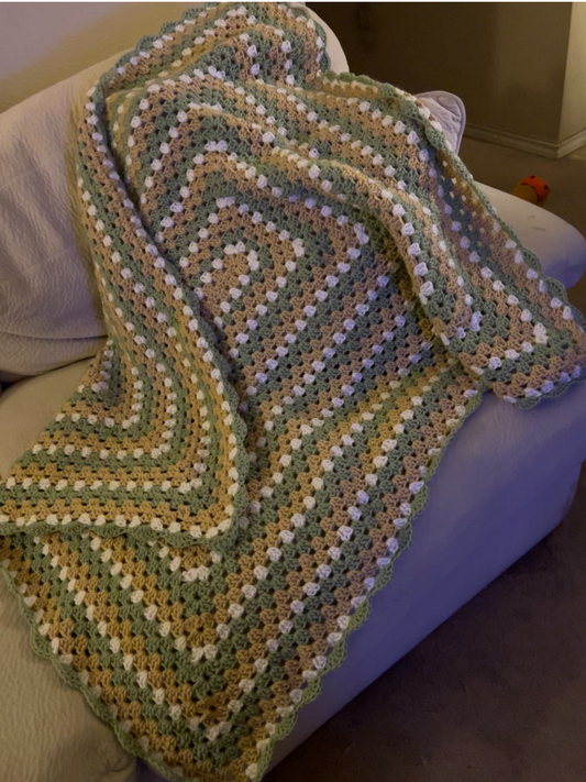 Handmade crocheted Granny square crib size baby blanket